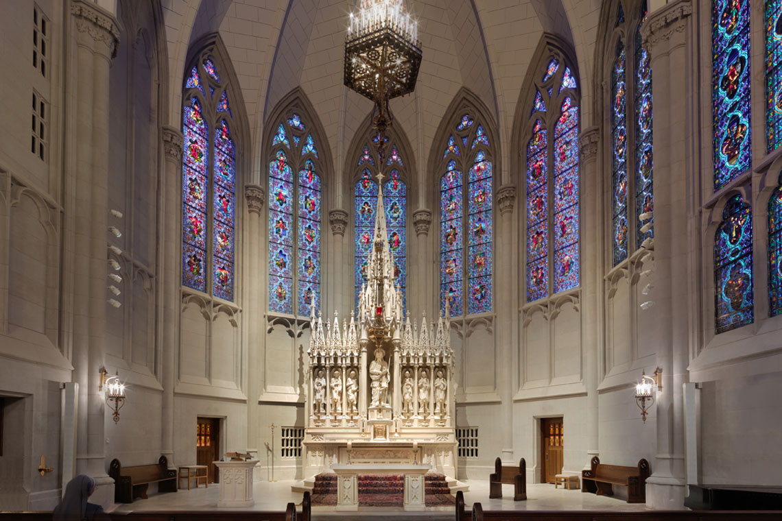 The altar and stained-glass windows of Saint James Chapel